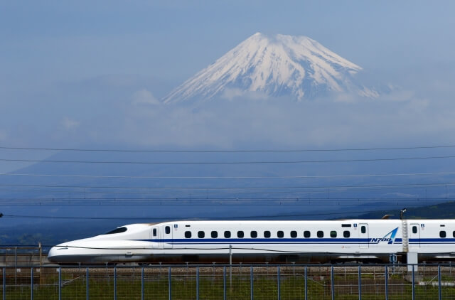 Shinkansen in front of Mount Fuji