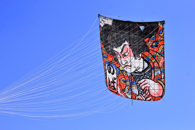 takoage flying a kite