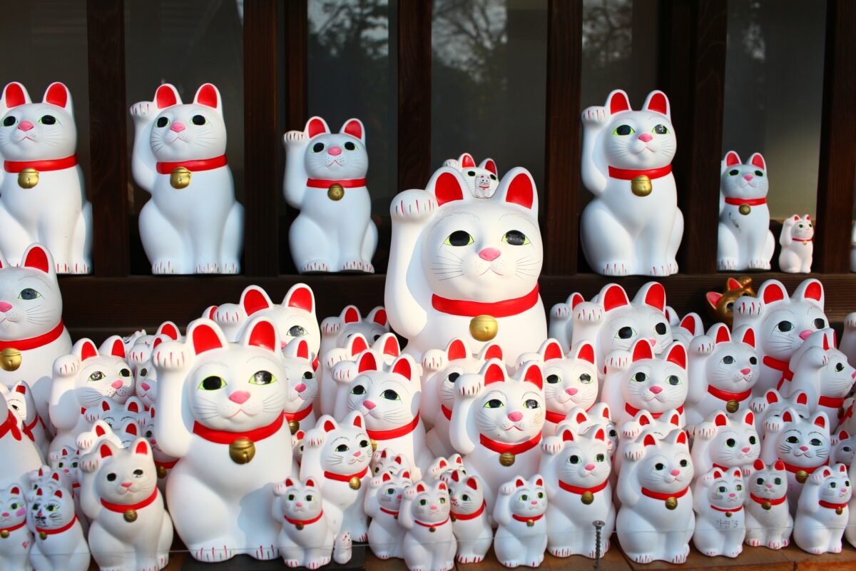 The Origin of the Waving Cat