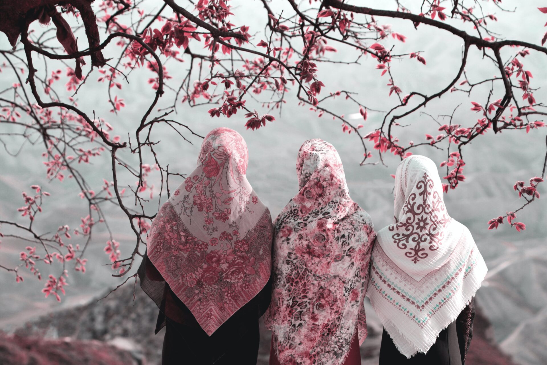 Girls wearing pink head scarfs