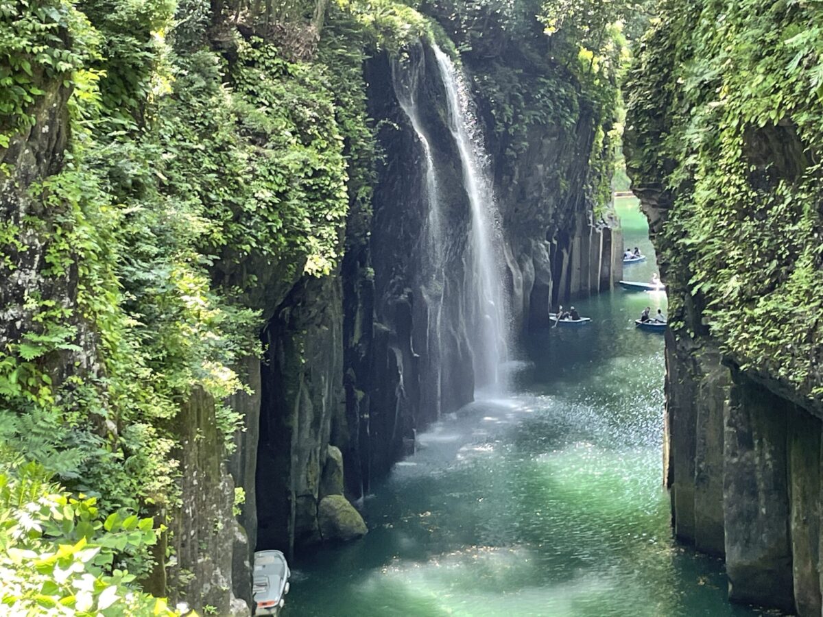 Boats and waterfall of the Takachiho Gorge